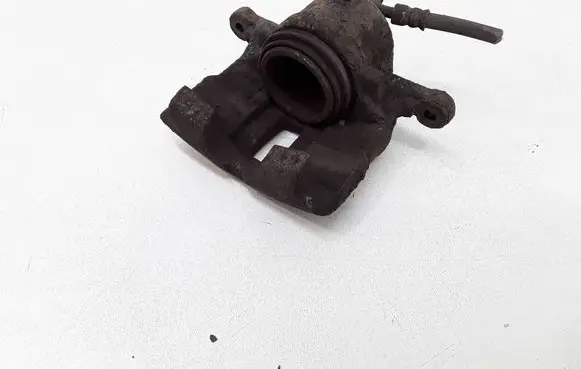Nissan Almera N16 Front brake caliper