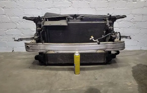 Radiator support slam panel