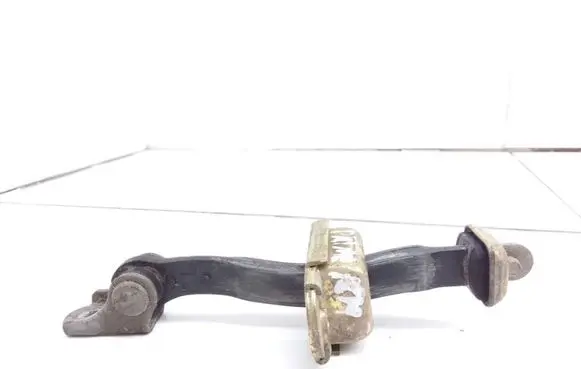 Nissan Primera Front door check strap stopper