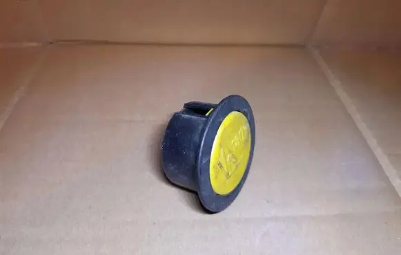 Loading door check strap stopper