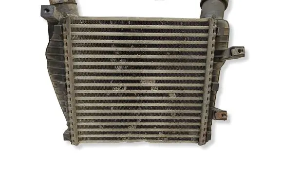Volkswagen Touareg I Intercooler radiator 