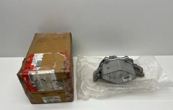 Chevrolet Camaro Engine oil radiator 12644856 823566