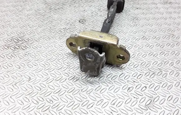 Nissan Primera Front door check strap stopper