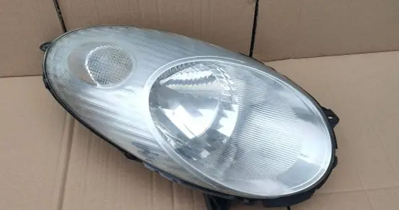 Nissan Micra Headlight/headlamp 26010AX700 89007102