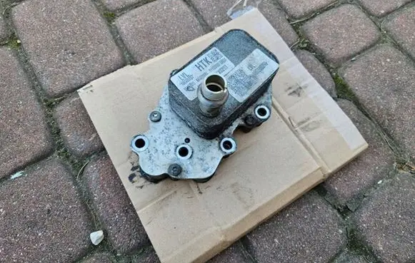 Opel Astra K Engine oil radiator 55497606