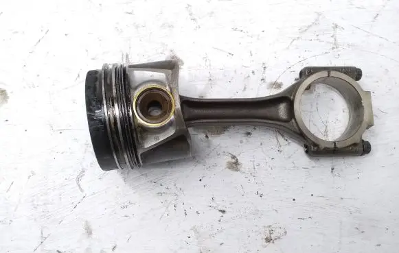 Piston with connecting rod