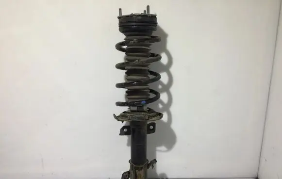 Ford Courier Front shock absorber with coil spring 61471139 2002142