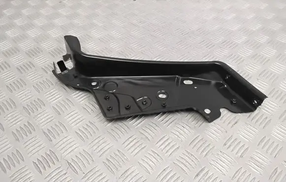 Nissan NV200 Headlight/headlamp mounting bracket F25123LMMA
