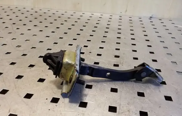 Front door check strap stopper