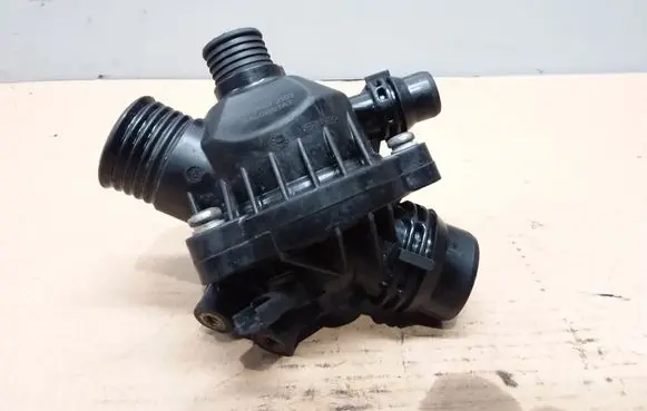 Thermostat/thermostat housing