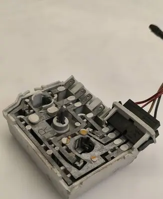 Tail light bulb cover holder