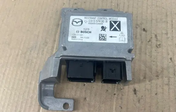 Mazda 5 Airbag control unit/module C51357K30B 0285011601