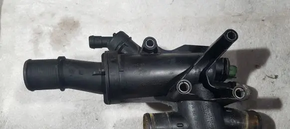 Thermostat/thermostat housing