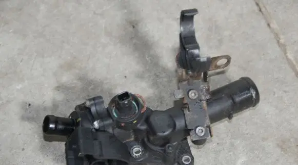 Thermostat/thermostat housing