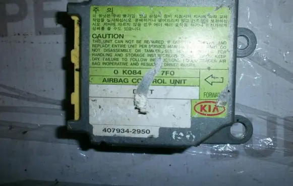 KIA Sportage Airbag control unit/module 0K08A677F0 4079342950