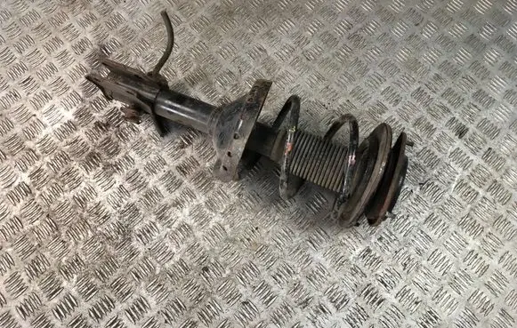 Subaru Legacy Front shock absorber with coil spring