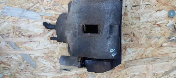 Mazda 323 Front brake caliper