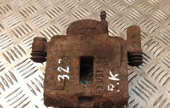 Mazda 323 Front brake caliper