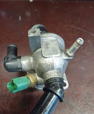 Thermostat/thermostat housing