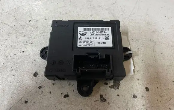 Jaguar XF X250 Door control unit/module 1001261201 AH2214D620AA