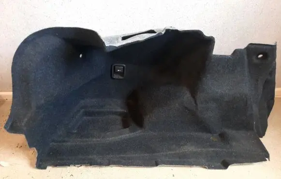 Trunk/boot lower side trim panel
