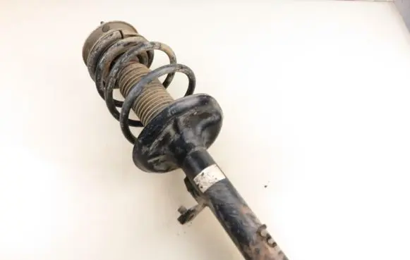 BMW X3 E83 Front shock absorber with coil spring 317571