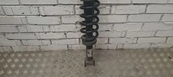 Ram 1500 DT Front shock absorber with coil spring 68320236AB
