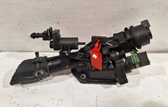 Thermostat/thermostat housing