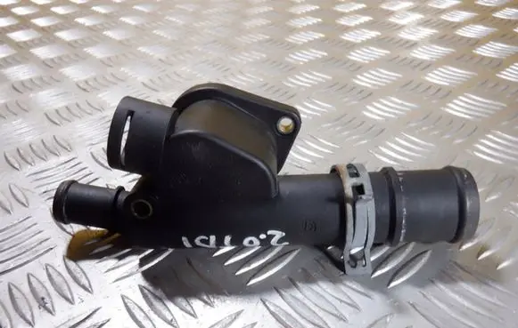 Volkswagen PASSAT B5 Engine coolant pipe/hose 038121132G
