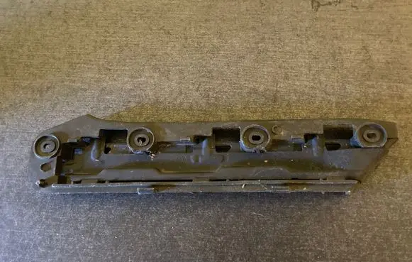Volkswagen Touran I Front bumper mounting bracket 1T0807936