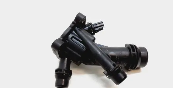 Thermostat/thermostat housing