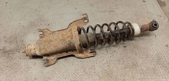 Saab 9-5 Rear shock absorber with coil spring 