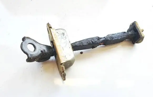 Front door check strap stopper
