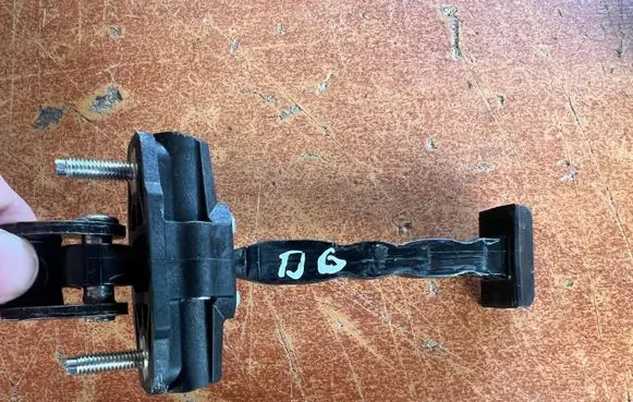 Ford Focus Rear door check strap stopper