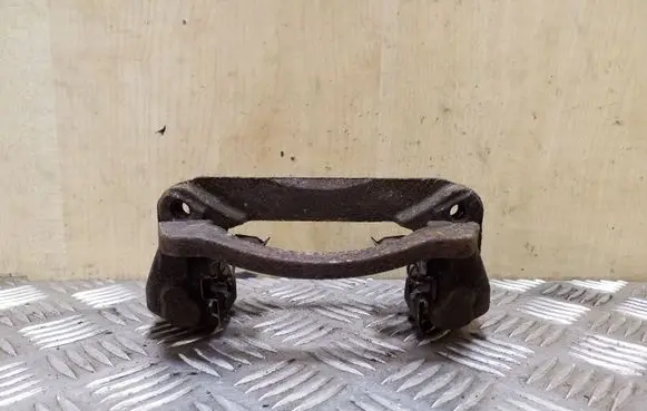 Subaru Outback Brake caliper pad carrier rear 