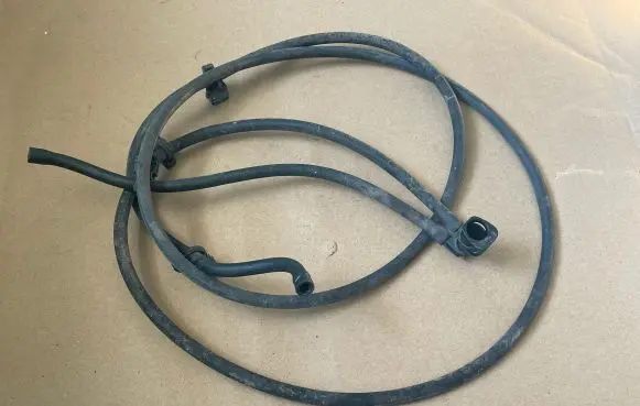 Opel Astra J Headlight washer hose/pipe 13258416