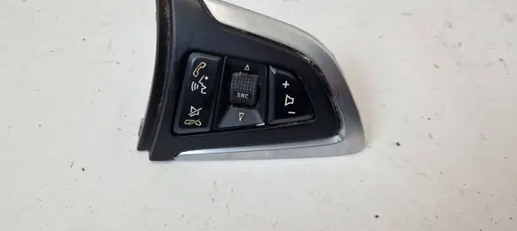 Steering wheel buttons/switches