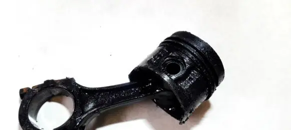 Nissan Almera Piston with connecting rod 34357J1