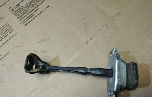 Honda FR-V Rear door check strap stopper