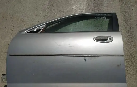 Chrysler Sebring (ST-22 - JR) Front door pilkos