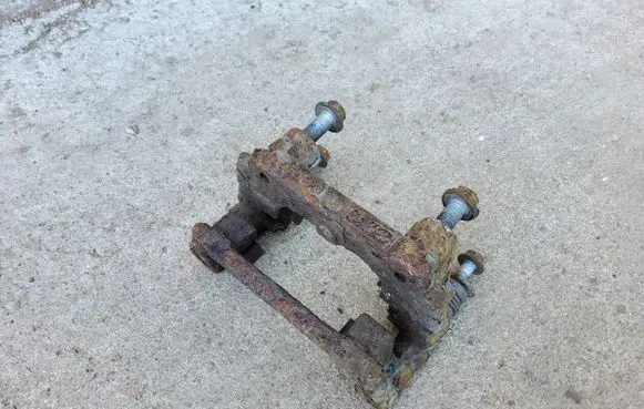 Ford Mondeo Mk III Brake caliper pad carrier rear 