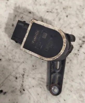 Headlight/headlamp level sensor