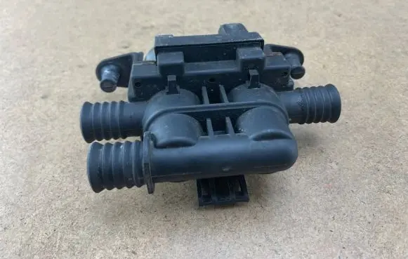 Coolant heater control valve