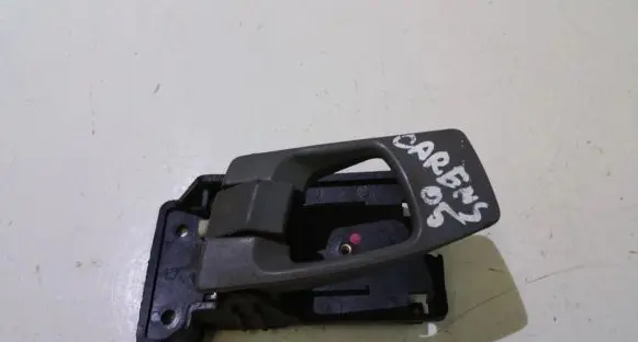 KIA Carens I Front door interior handle