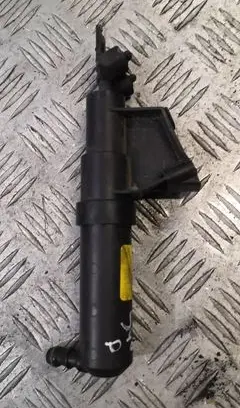 Headlight washer spray nozzle