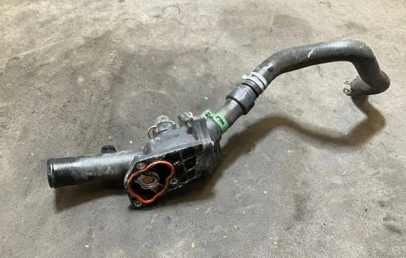 Thermostat/thermostat housing
