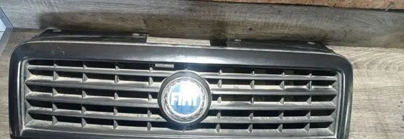 Fiat Doblo Front bumper upper radiator grill 735395576