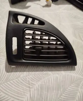 Dash center air vent grill
