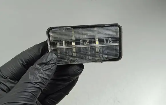 Jeep Wrangler Number plate light 68310837