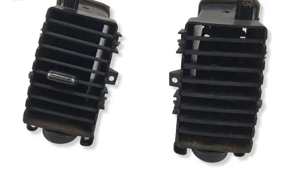 Nissan Navara D40 Dash center air vent grill 687515X00A